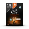 Capsules Café Royal compatibles Nespresso posées sur une table en bois