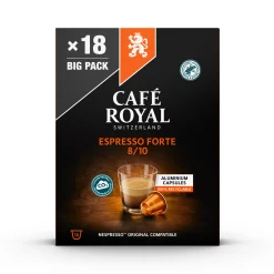 Capsules Café Royal compatibles Nespresso posées sur une table en bois
